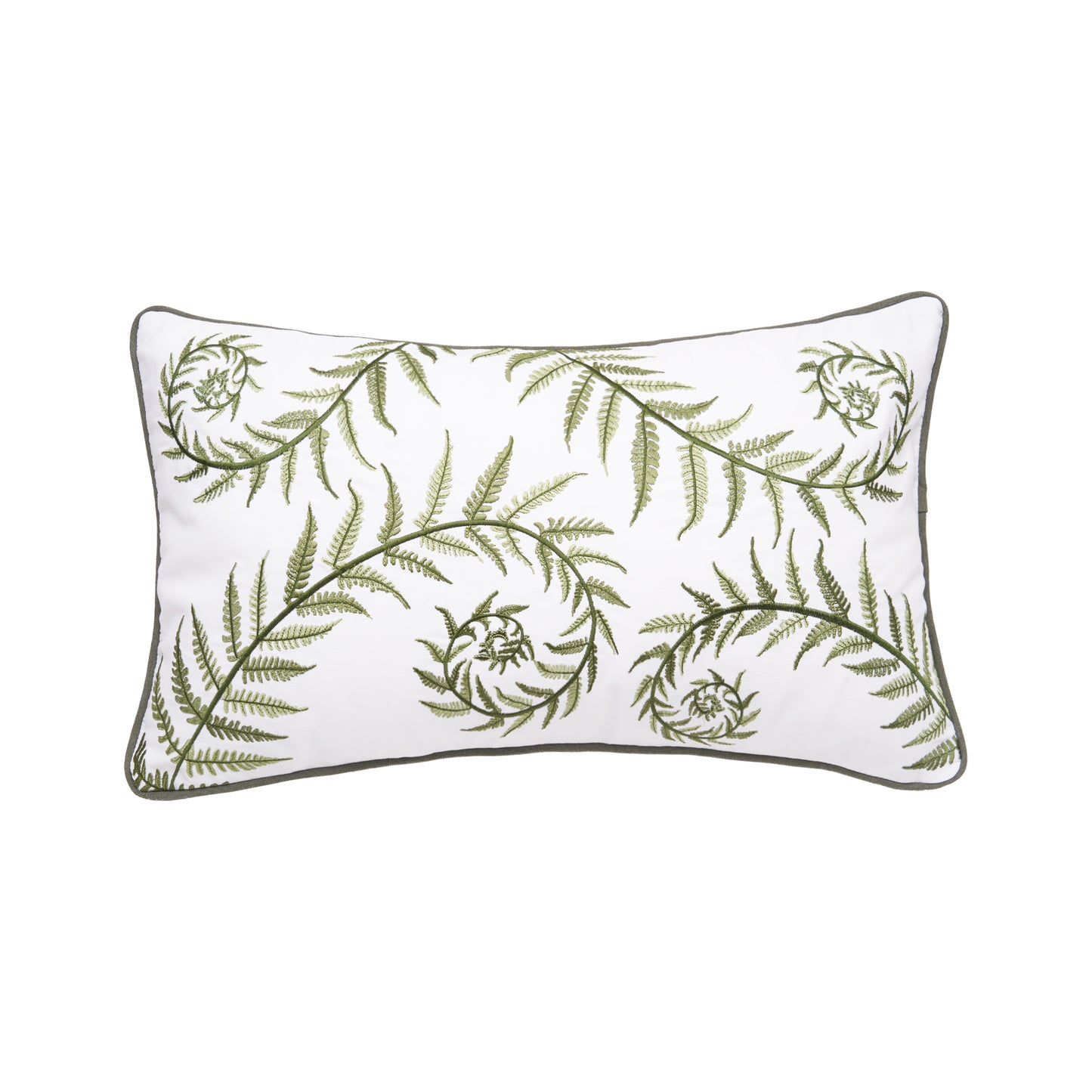 White pillow with green fern branches across the pillow