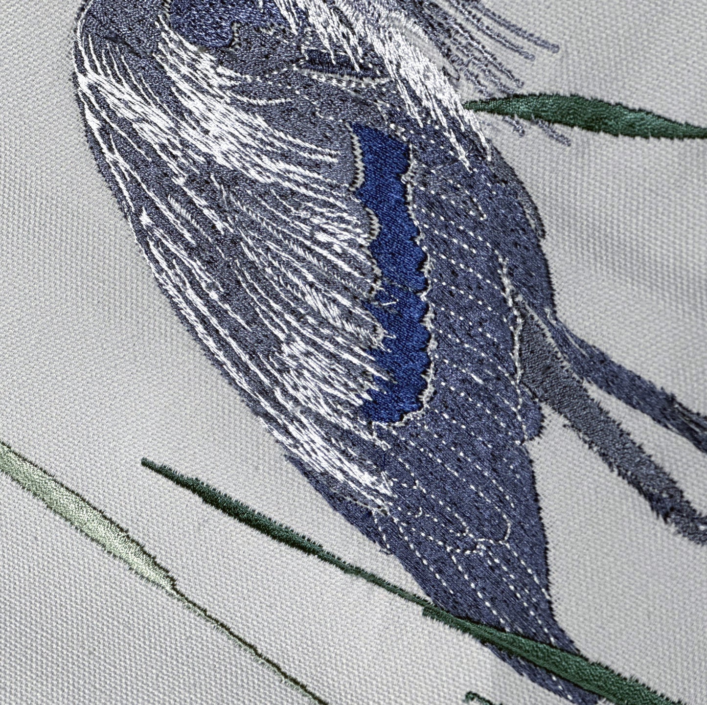 Zoom in detail of embroidery of Great Blue Heron on Grey Cotton Backing