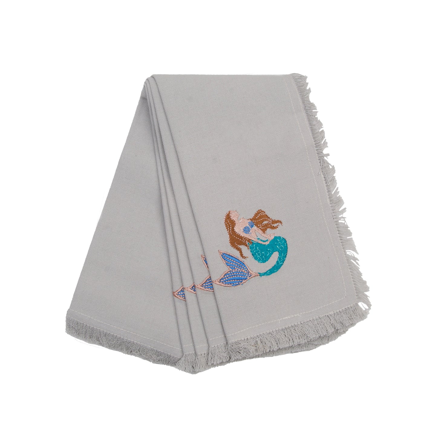 Fringed grey cotton napkins, featuring an embroidered mermaid with brown hair and a turquoise tail.