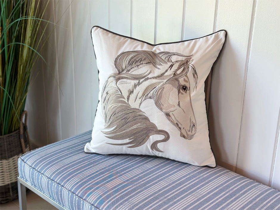 Head Strong Right Indoor Outdoor Pillow styled on a bench.