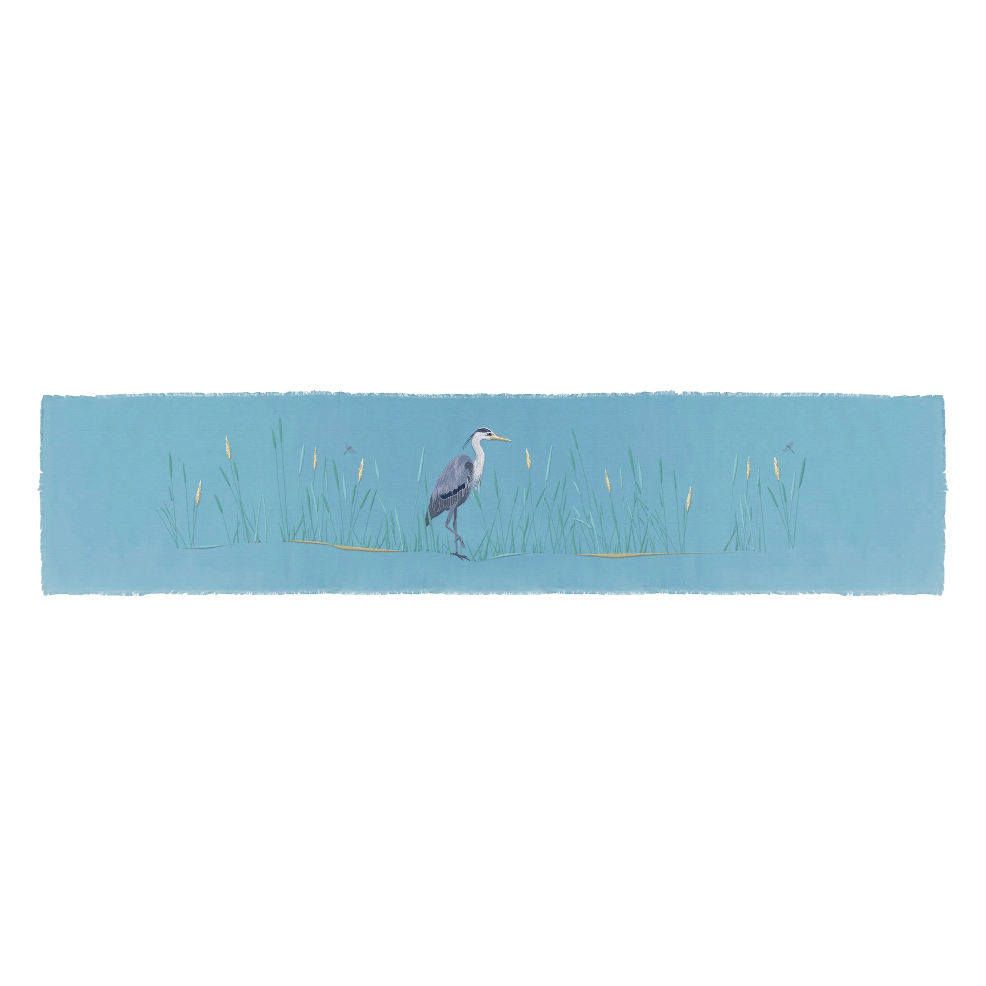 Blue Heron in the reeds embroidered on blue cotton fabric with fringe edged placemat..