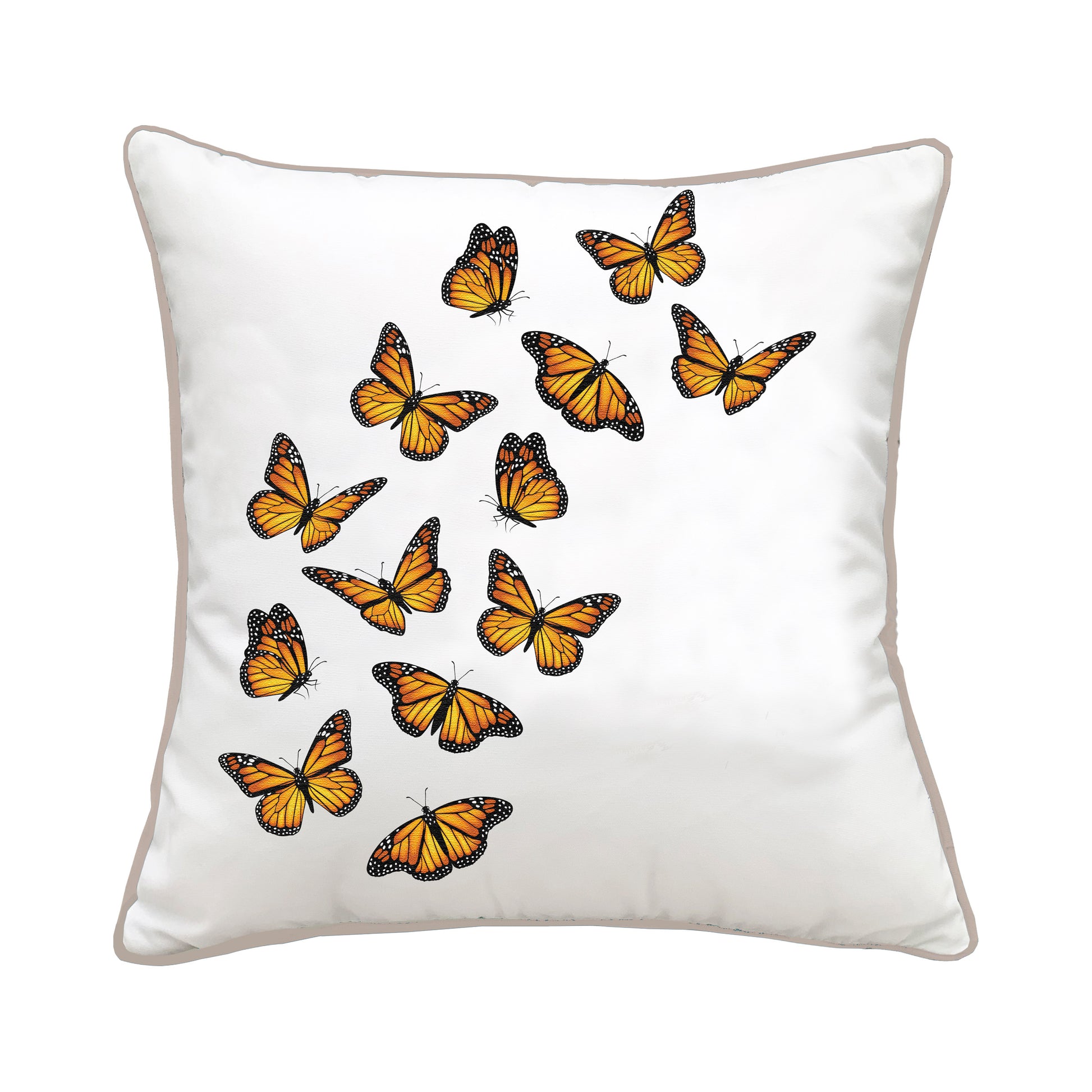 White pillow with orange butterflies flying across the pillows