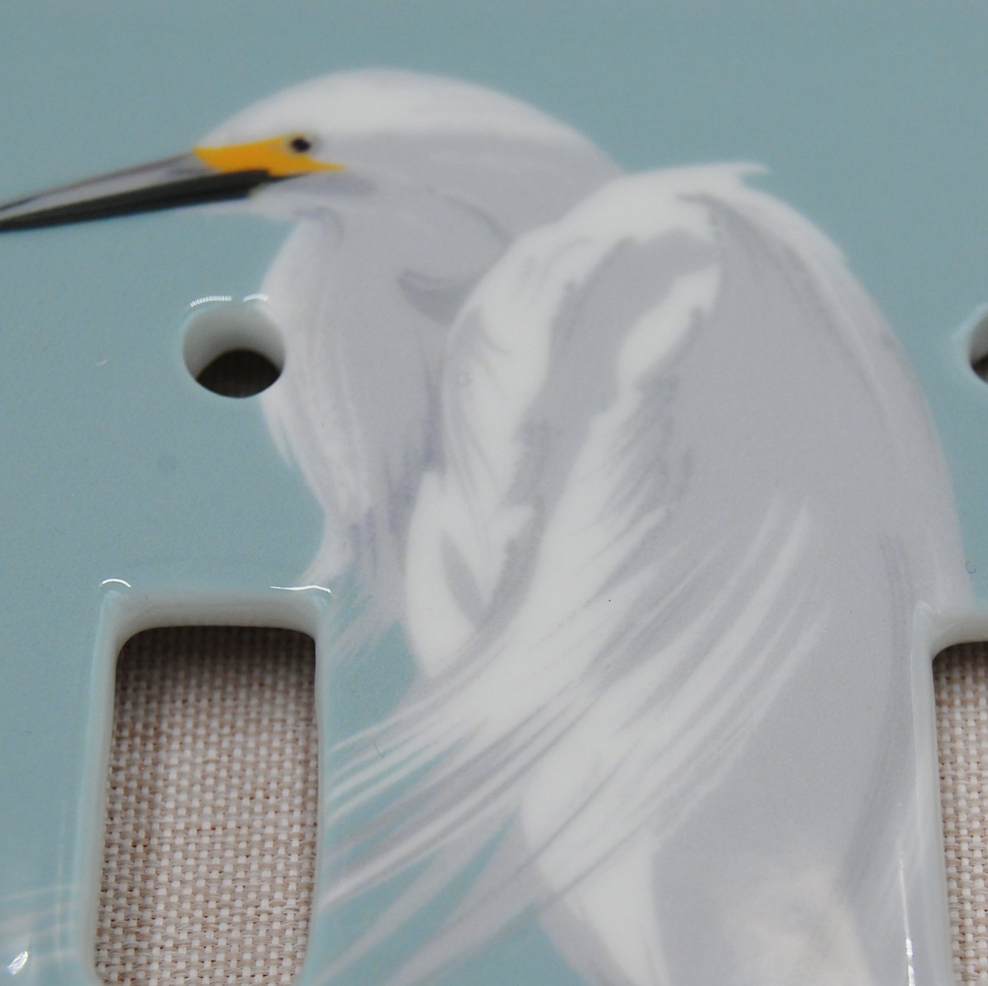 Detail shot of the White Egret Switch Plate.