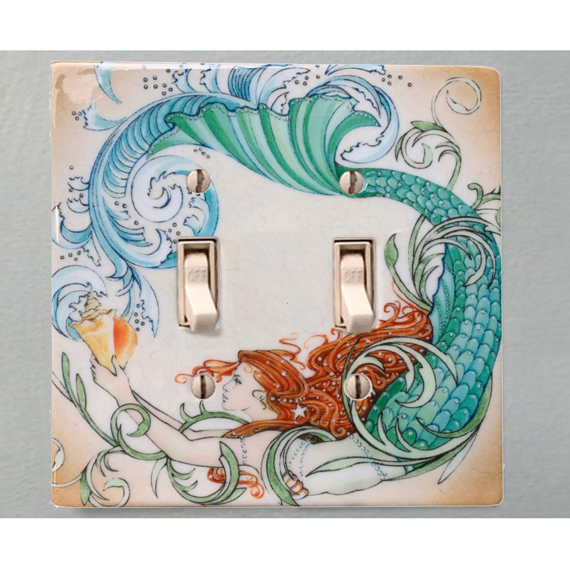 The Vintage Mermaid switch plate in use.