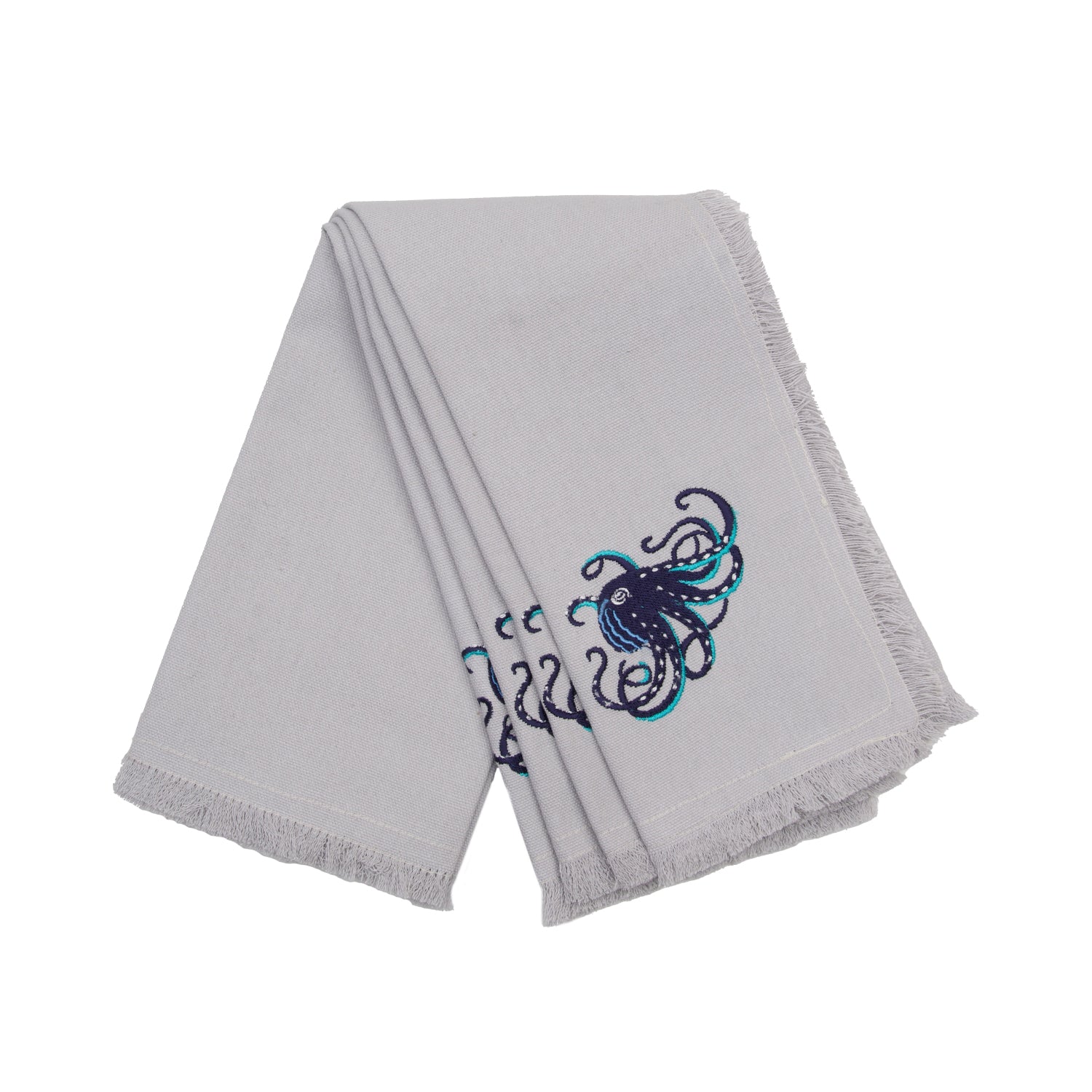 Navy octopus with teak tentacles embroidered on fringed grey cotton napkins.