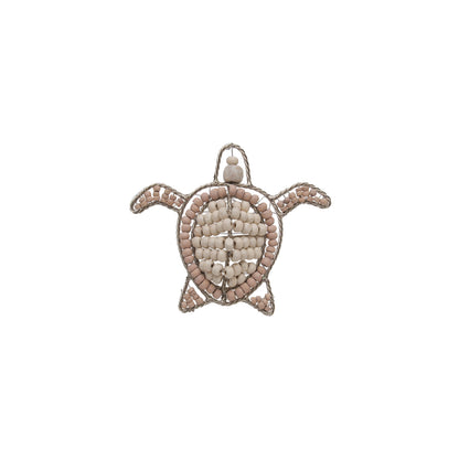 Sea Turtle shaped napkin ring crafted of natural beads.