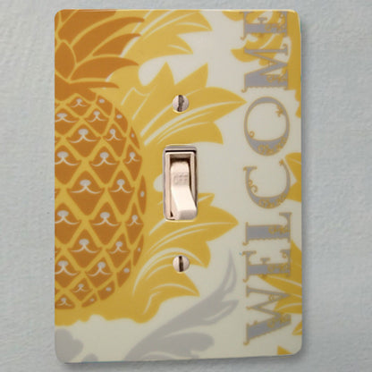 Porcelain Pineapple Welcome switch plate in use.
