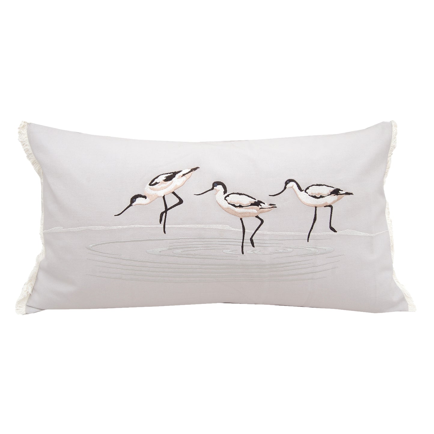 Three avocent birds wading through a pool of water; embroidered on a soft grey background with white fringe edging. Lumbar indoor pillow.