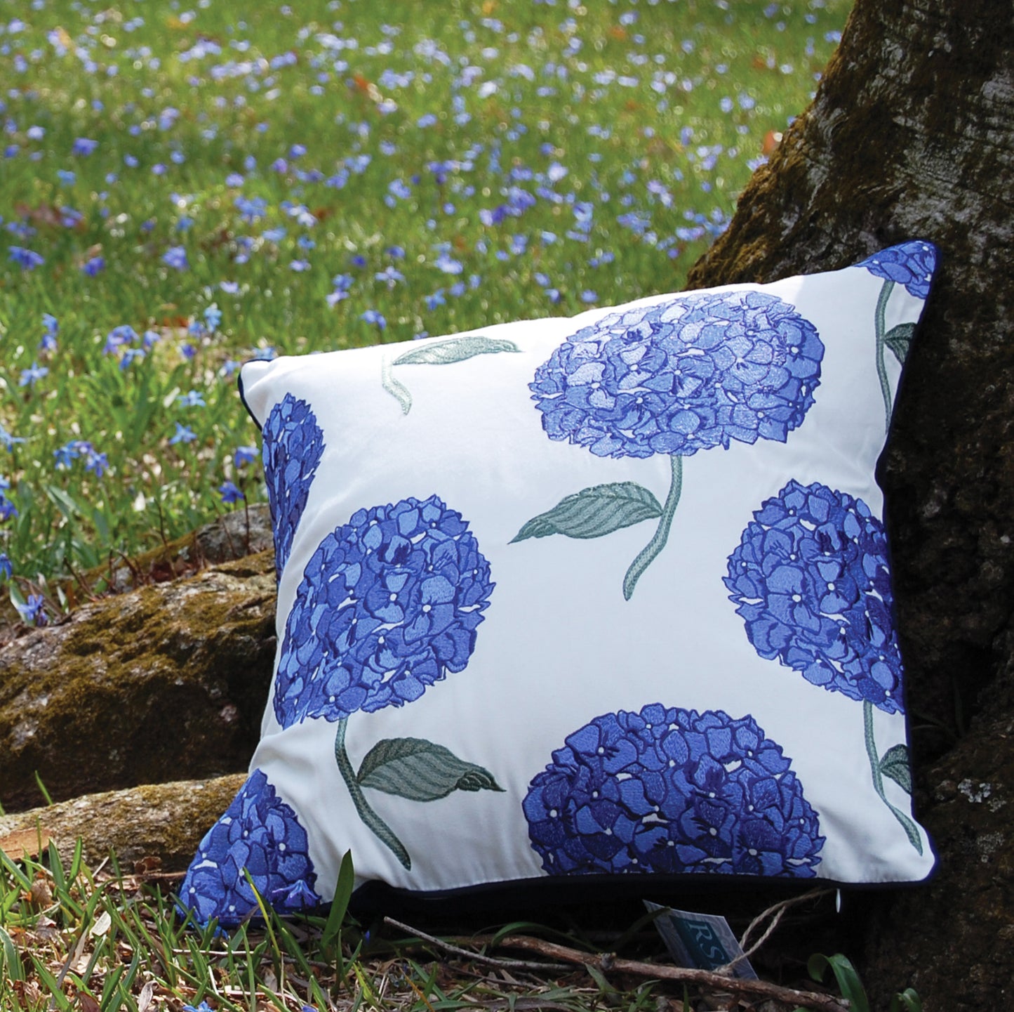 Hydrangea Pattern pillow styled outdoors.