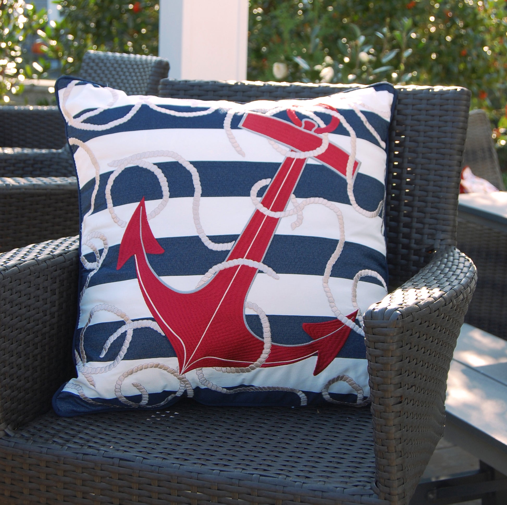 Blue Stripe Red Anchor styled on an outdoor rocker.