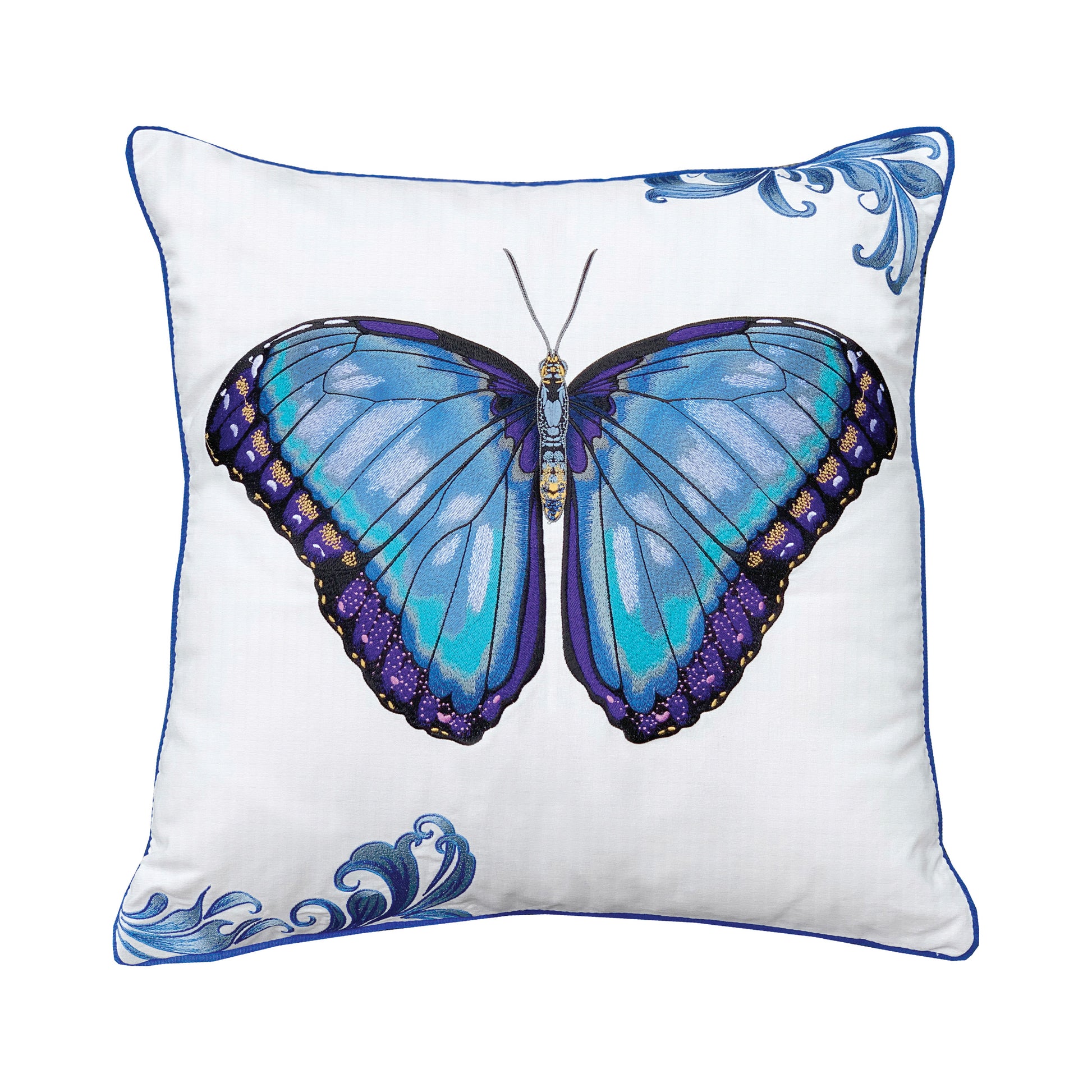 Large blue butterfly with purple, black, and gold accents embroidered on a white background. Blue scroll accents are located in the top right and bottom left corners.