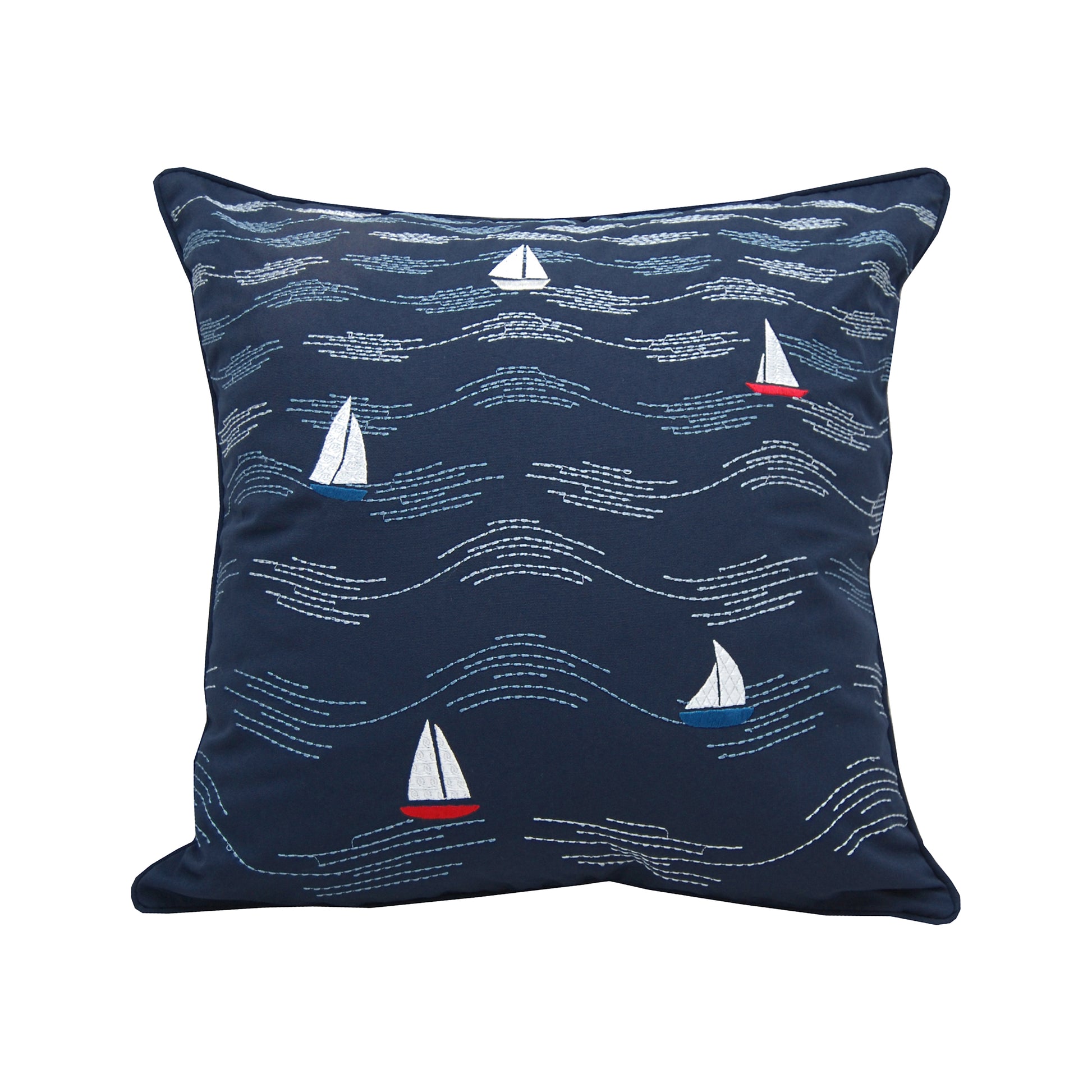 Five sailboats riding modern styled waves are embroidered on a navy blue background.