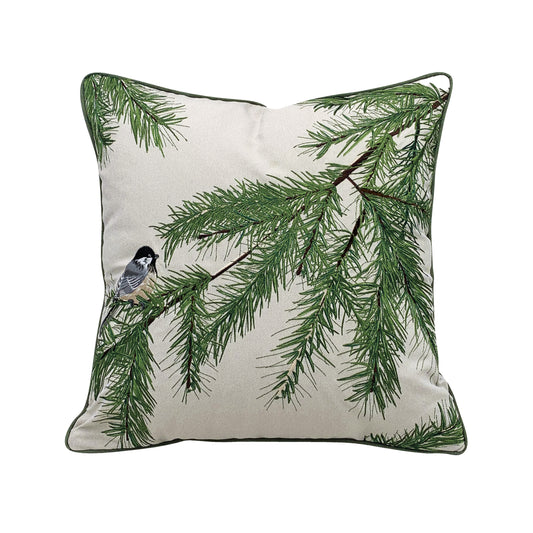 A chickadee sitting amongst boughs of pine embroidered on a beige background.