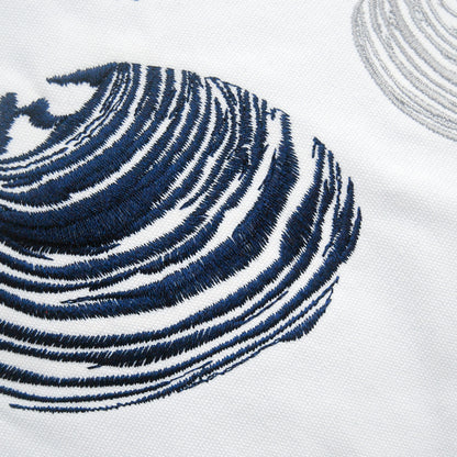 Detailed shot of the Clam Pattern Pillow embroidery.