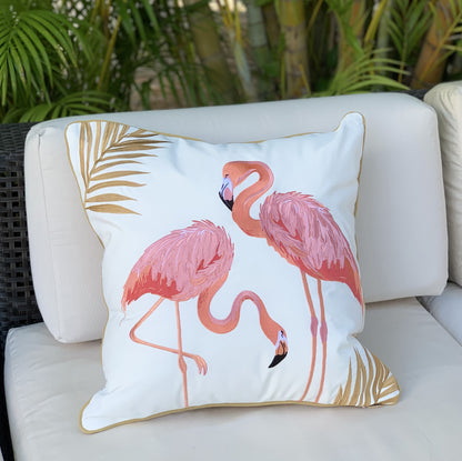 Flamingo Fancy pillow styled on an outdoor couch.