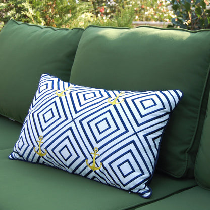 Geo Pattern Nautical pillow styled on a green outdoor couch.