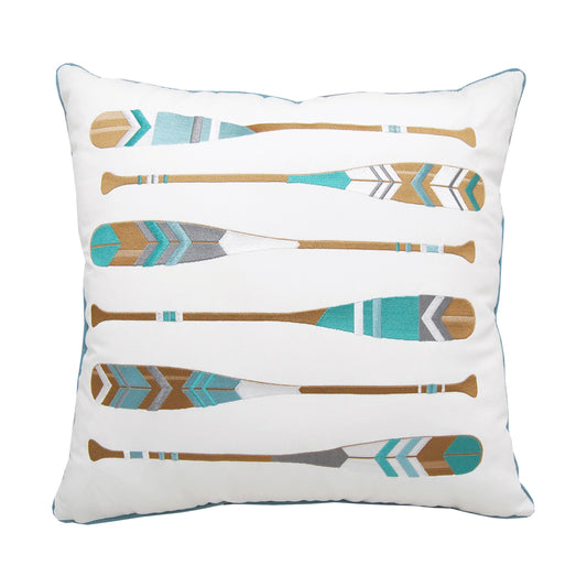 The Lake Oars Indoor Outdoor pillow has six alternating oars with teal, lightblue, white, and grey geometric designs embroidered on a white background.