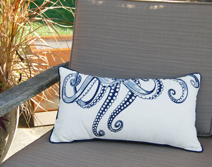 Octopus Tentacles Indoor Outdoor pillow styled on an outdoor patio chair.