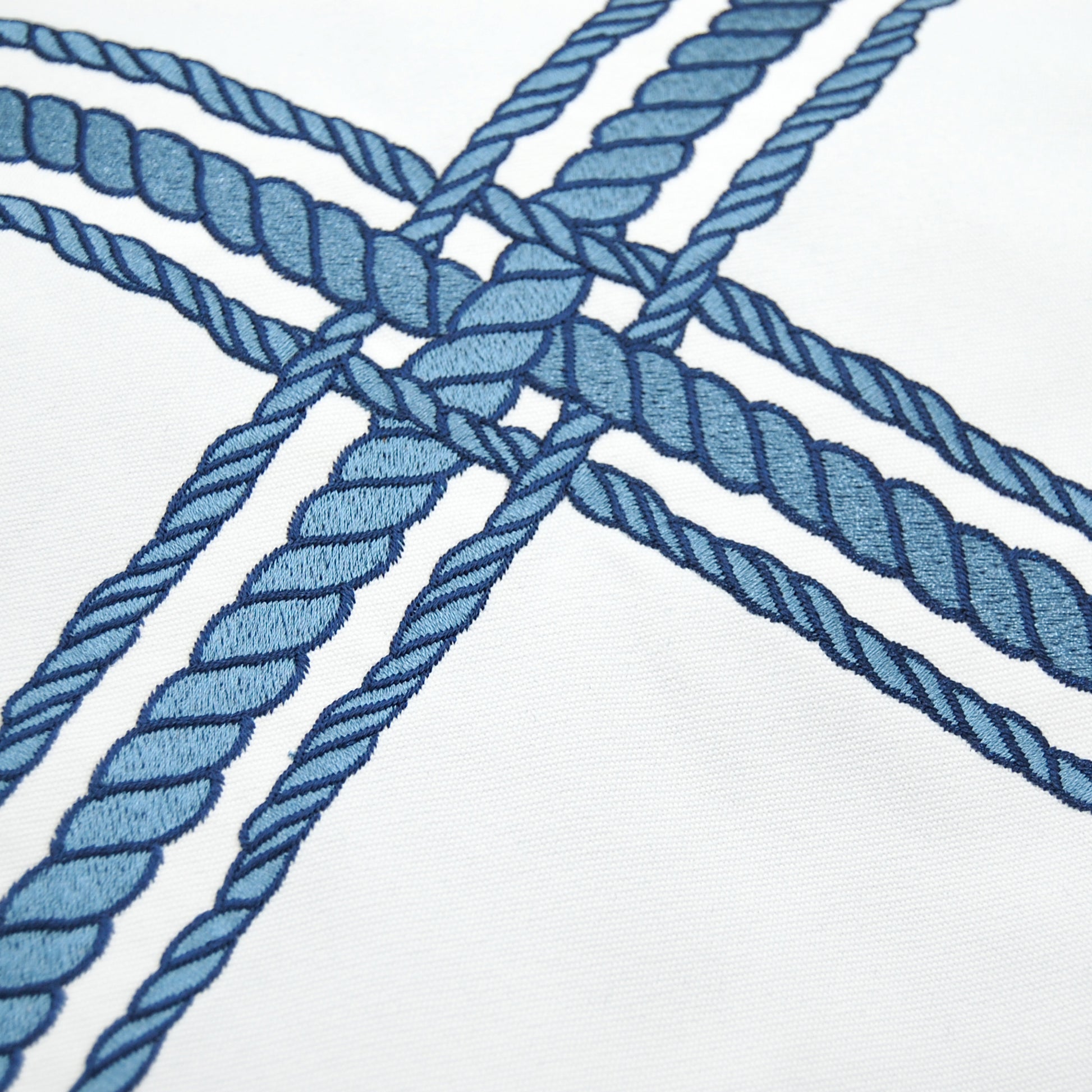 Detailed shot of the Rope Lattice White Indoor Outdoor Pillow.