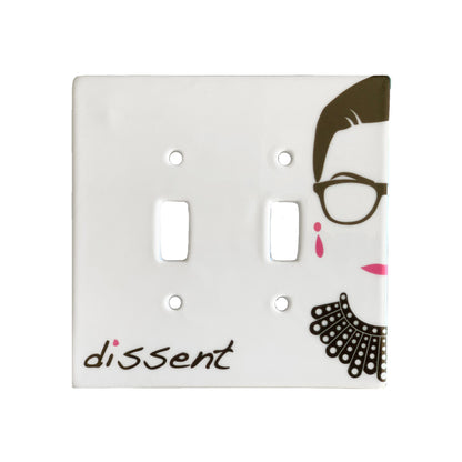 ceramic double toggle switch plate featuring the silhouette of Ruth Bader Ginsburg. Featuring on the bottom left side of the plate is the word "dissent".