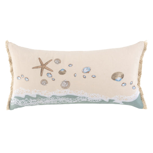 A sea star, scallop and clam shells, embroidered along the breaking shoreline. Pillow finished with fringe edges.