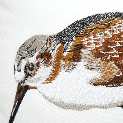 Detail shot of the embroidered work on the Piper Chillin' Left Indoor Outdoor Pillow