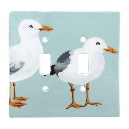 blue double toggle switch plate featuring two seagulls.