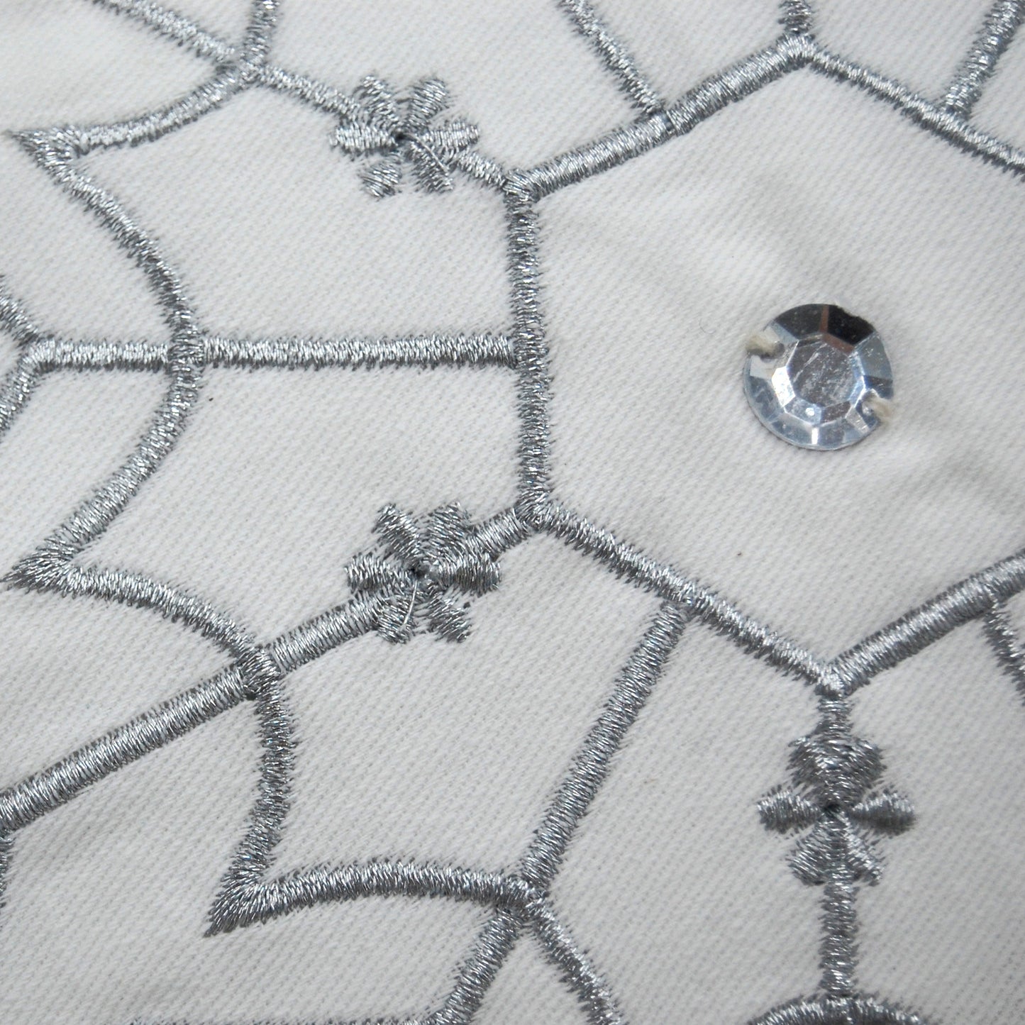 Detail shot of the Snowflake Shaped Pillow.