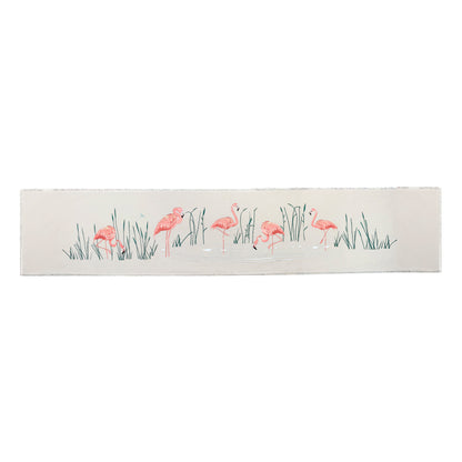 Table Runner depicting embroidered Pink Flamingos and Reeds on a tan cotton background with fringe edges. 