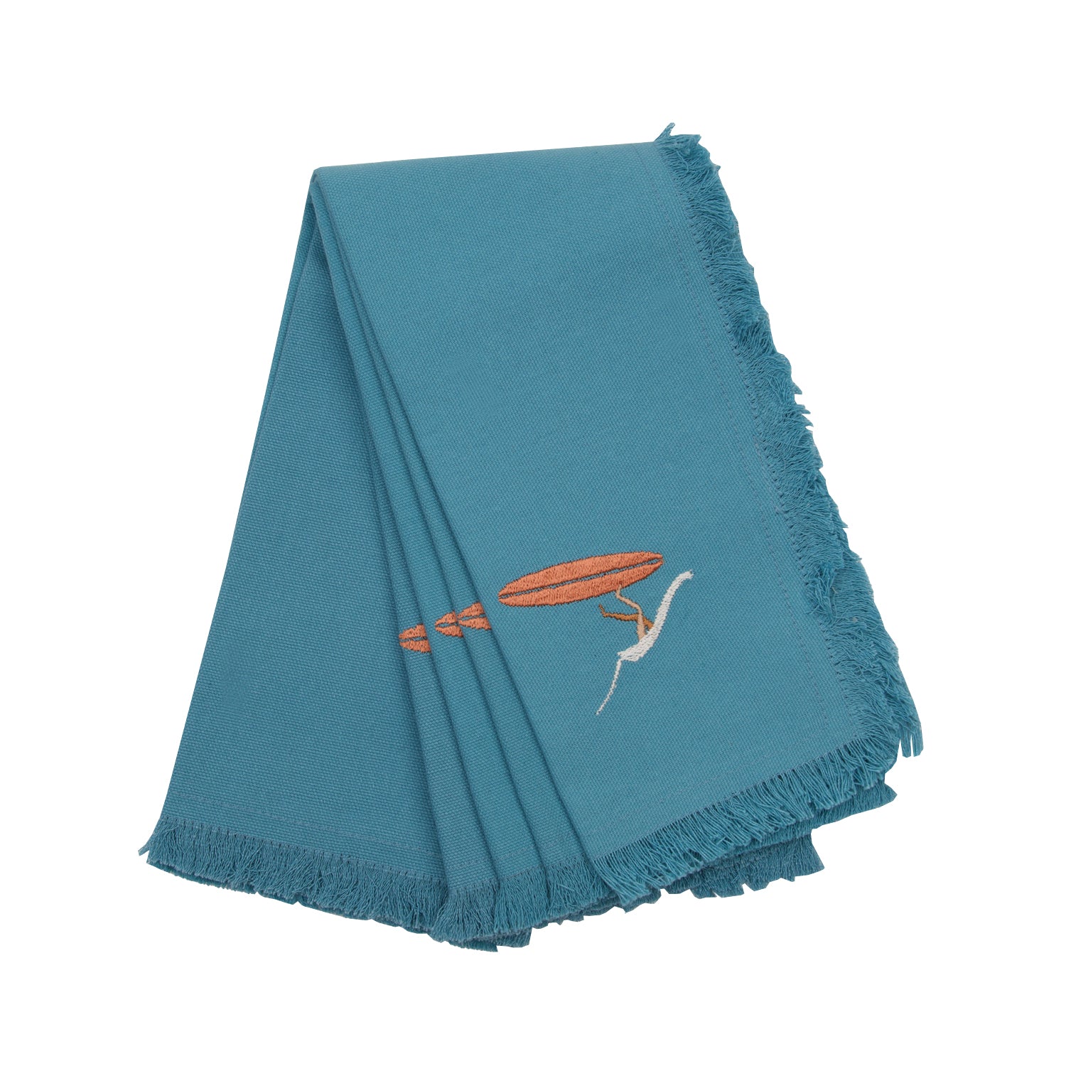 embroidered napkins in a cool coastal blue featuring fringed edges. Multicolored embroidery scene with a bird’s eye view of a surfer falling off his board into  the waves.
